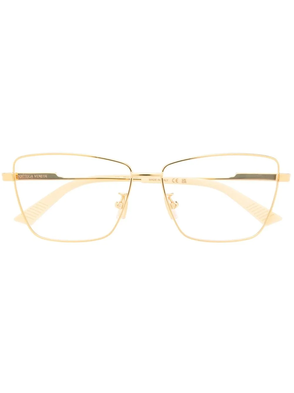 Bottega Veneta Eyewear lentes con armazón cat eye metalizados - Dorado
Bottega Veneta Eyewear lentes con armazón cat eye metalizados - Dorado
