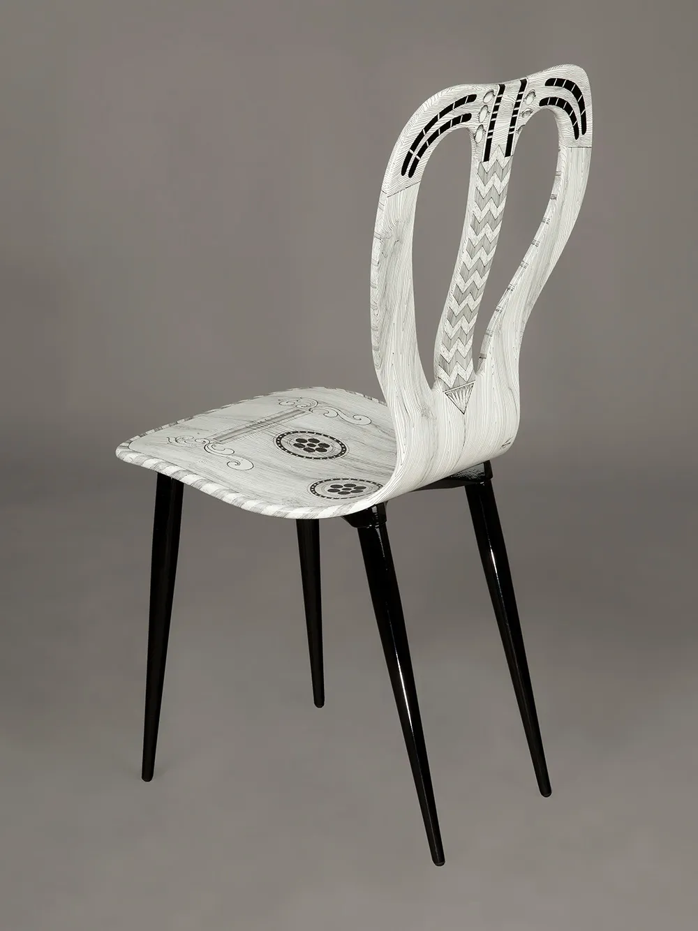 Fornasetti Guitar chair