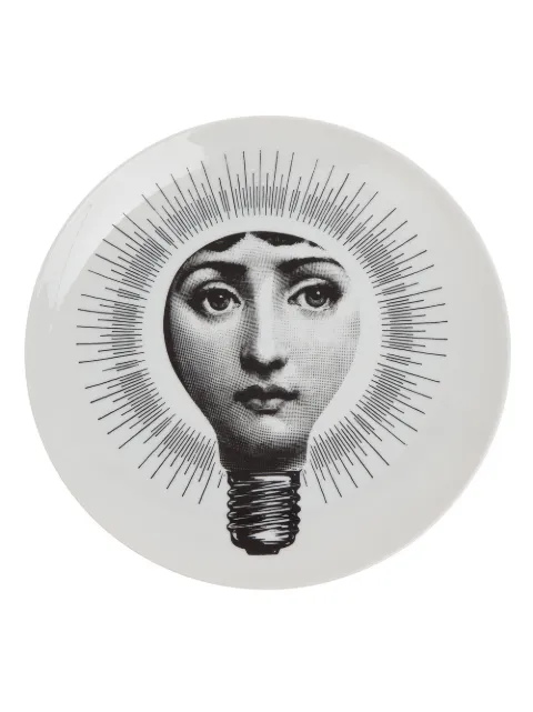 Fornasetti plato con motivo de rostro en bombilla