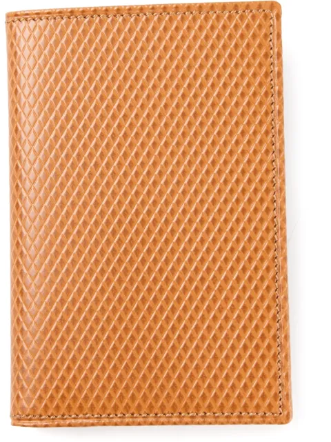 Comme Des Garçons Wallet textured bi-fold wallet