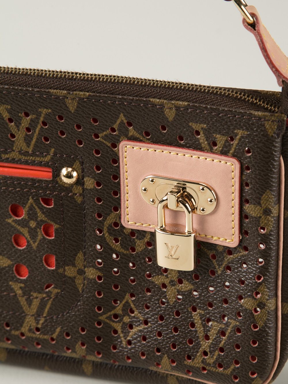 Louis Vuitton Vintage Collector Dots Clutch, $871, farfetch.com