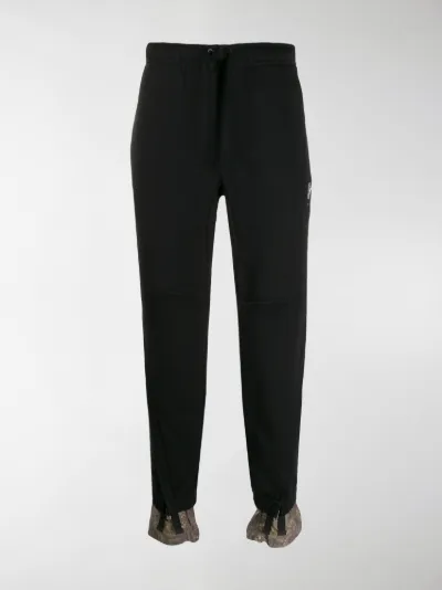 nike tapered track pants