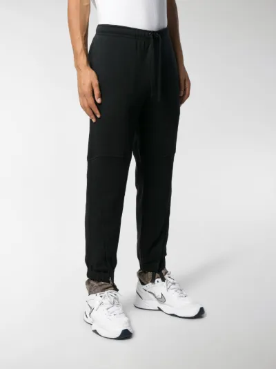 nike tapered track pants