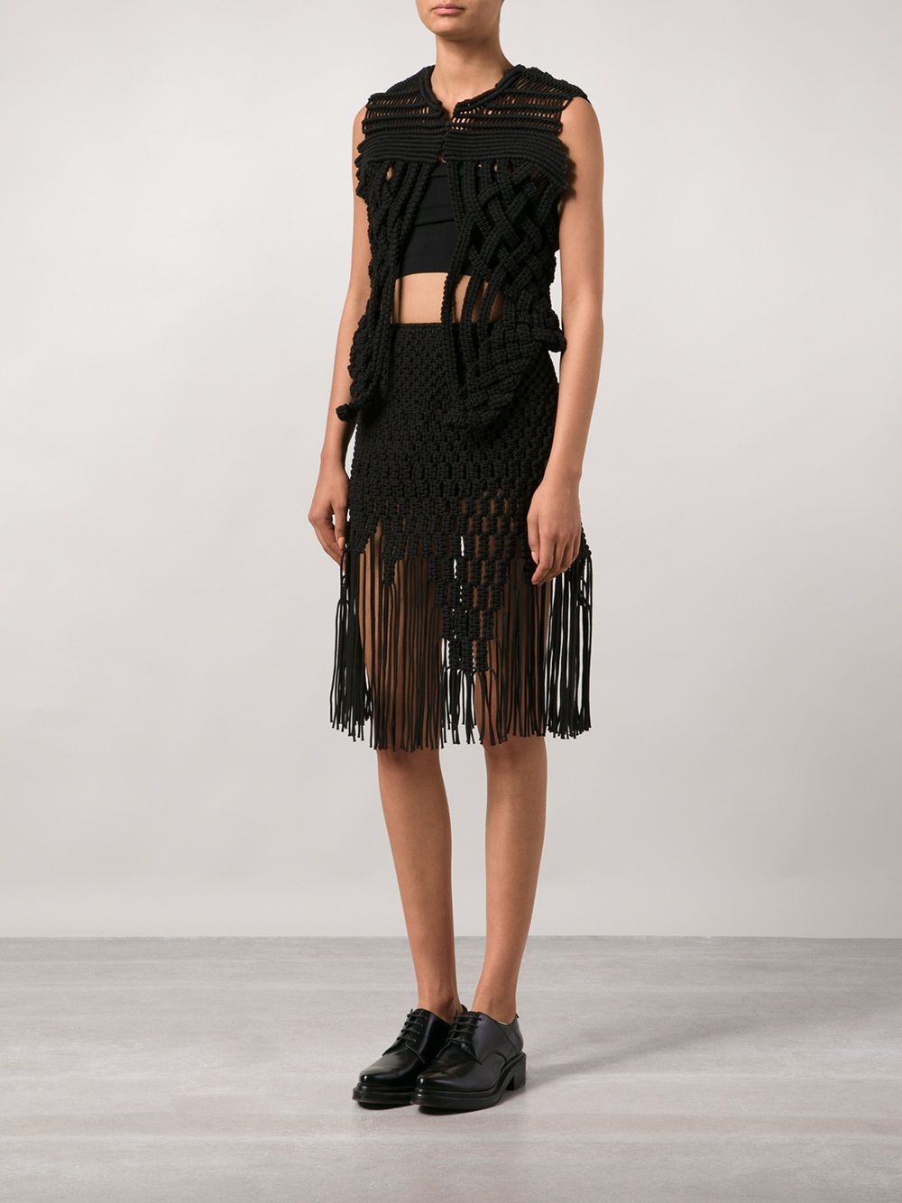 Noir Kei Ninomiya fringed hem braided skirt - Zwart