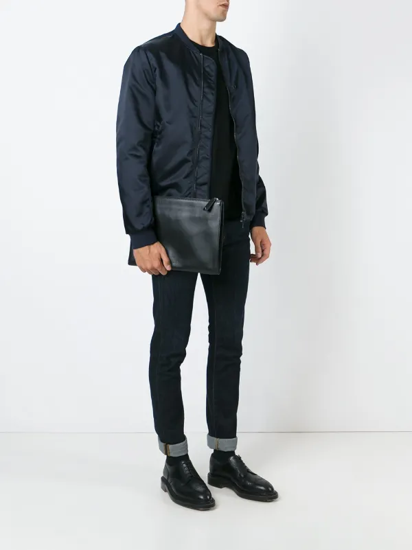 Valentino Garavani ロックスタッズ クラッチ | ブラック | FARFETCH JP