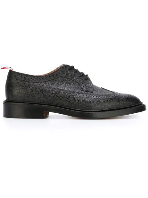 Click to view more detailed imagery on our partner's website Thom Browne Classic Longwing Brogue With Leather Sole In Black