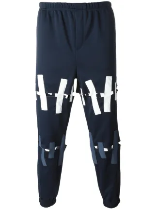 torn track pants