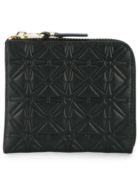 Click to view more detailed imagery on our partner's website Comme Des GarÇons Comme Des Garcons Small Star Embossed Zip Wallet In Black