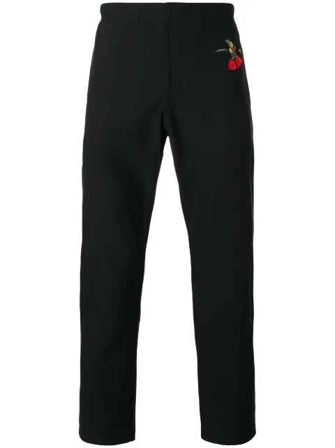 Alexander McQueen swallow print tapered trousers