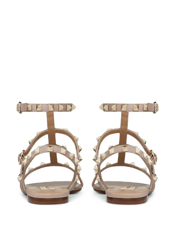 Valentino Garavani Rockstud ankle strap Flat Sandals Neutrals FARFETCH UK