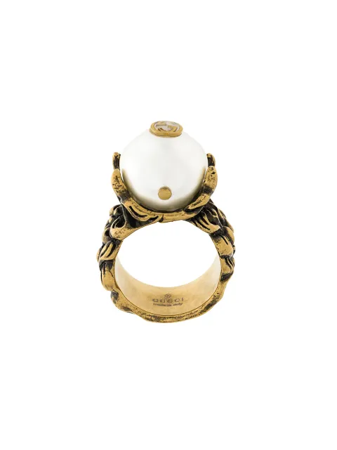 Gold Prongs Clipped To Eye Teeth