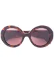 Imagen 1 de Alexander McQueen Eyewear gafas de sol con montura redonda y apliques