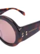 Alexander McQueen Eyewear gafas de sol con montura redonda y apliques