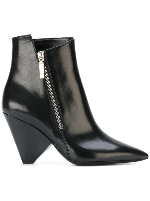 Click to view more detailed imagery on our partner's website Saint Laurent Niki Wedge Booties In Patent Leather In 1000 Nero