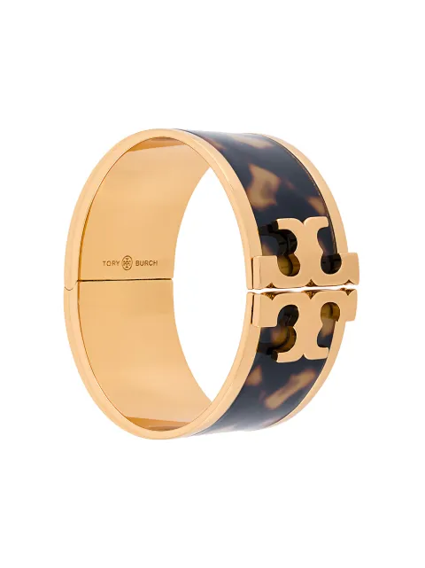 Click to view more detailed imagery on our partner's website Tory Burch Brass And Tortoise Raised Logo Wide Cuff Bracelet In Tortoise/tory Gold
