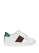 الصورة 1 من Gucci Kids بلوزة جلود منخفضة بشبكة إنترنت