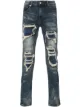 Image 1 of God's Masterful Children distressed skinny jeans