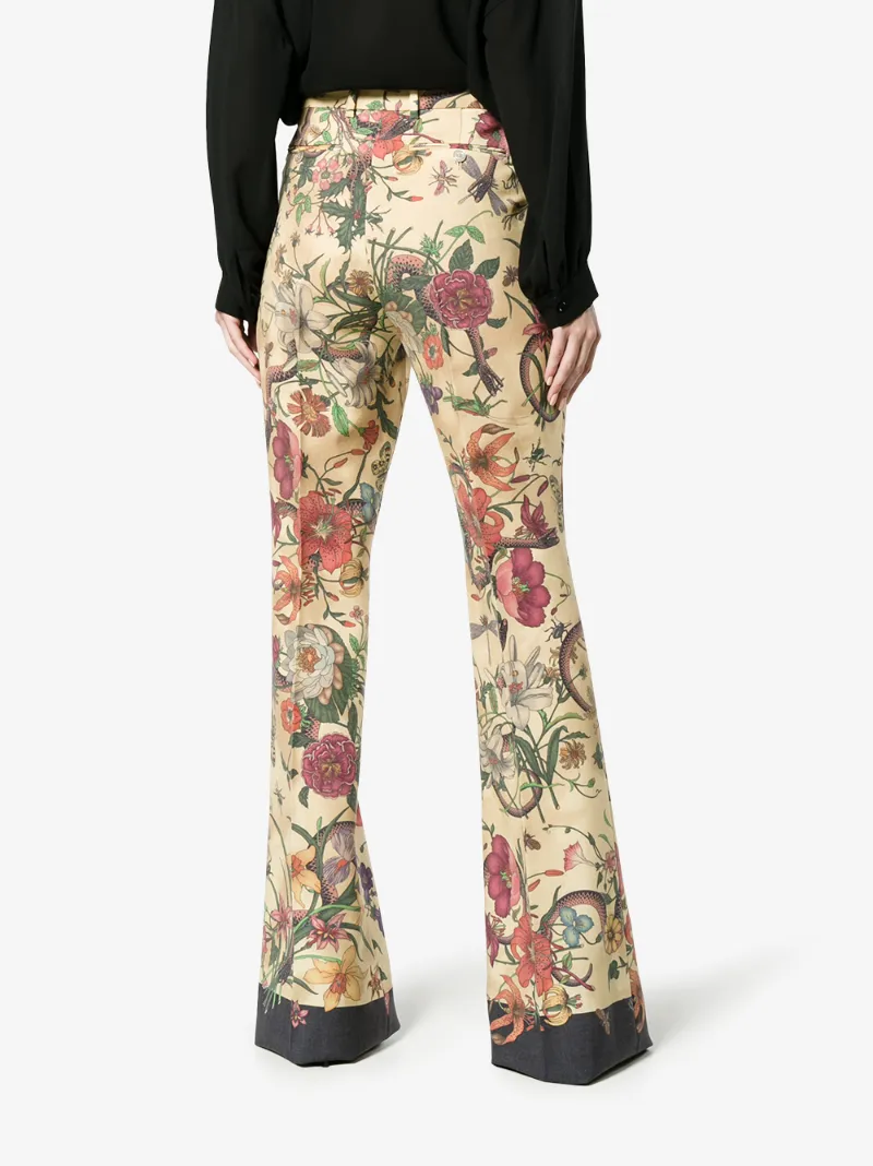 GUCCI GUCCI HIGH-RISE FLARED FLORAL SNAKE PRINT TROUSERS