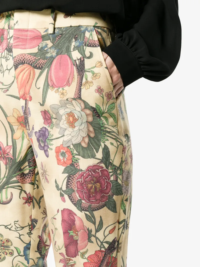 GUCCI GUCCI HIGH-RISE FLARED FLORAL SNAKE PRINT TROUSERS