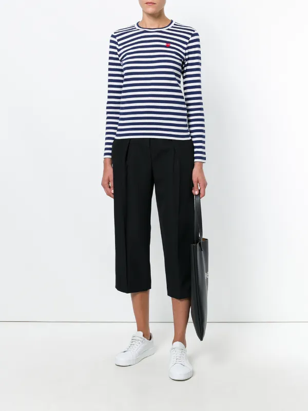 Comme Des Garçons Play  Farfetch.Portal.Infrastructure.CrossCutting.ExperienceWebGateway.Variation.TextDescription  - Farfetch