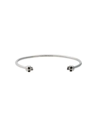 Alexander selling McQueen twin skull bracelet