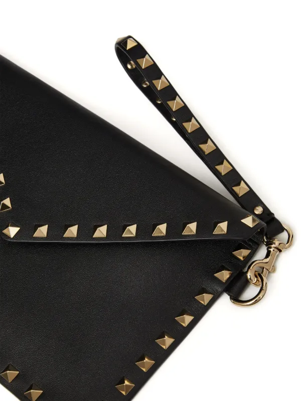 Valentino rockstud clutch sale shop