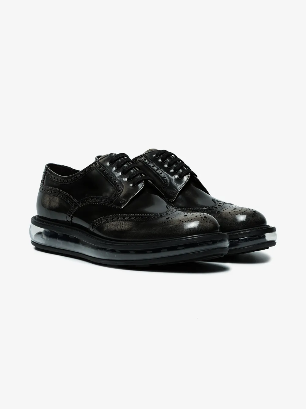 Prada Levitate Burnished-Leather Wingtip Brogues In Black | ModeSens