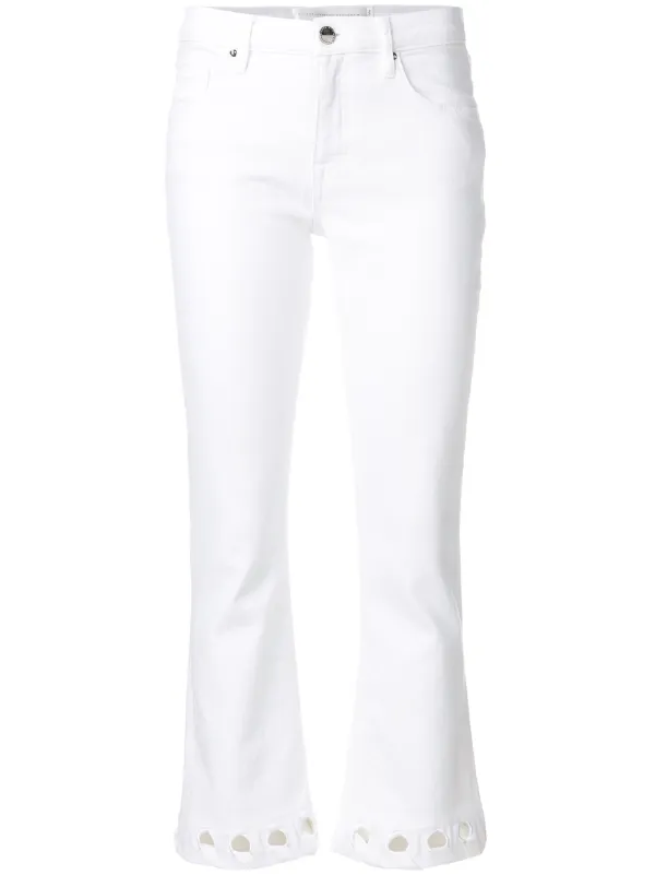 white cut out jeans