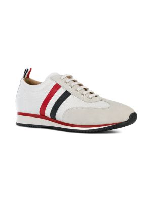 white sneakers with blue and red stripes