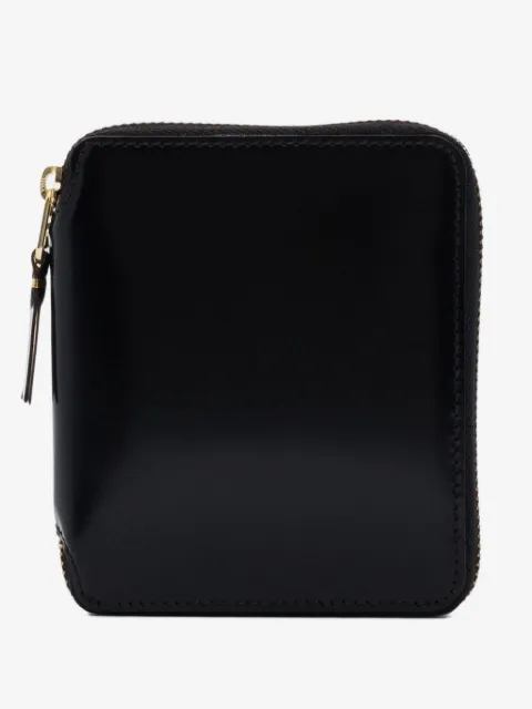 Comme Des Garçons Wallet portefeuille en cuir à fermeture zippée