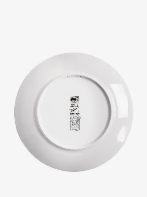 Fornasetti Teller mit Gesicht-Motiv