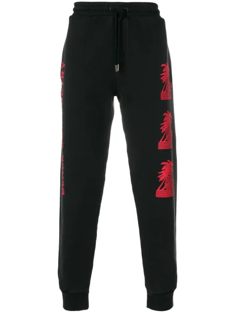 Click to view more detailed imagery on our partner's website Palm Angels Graphic Jogger Pants In Black