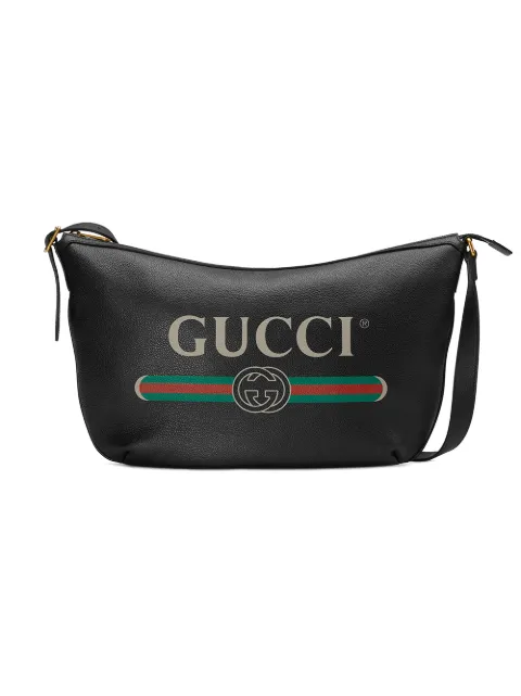 Click to view more detailed imagery on our partner's website Gucci Logo Print Half-moon Hobo Bag In Black