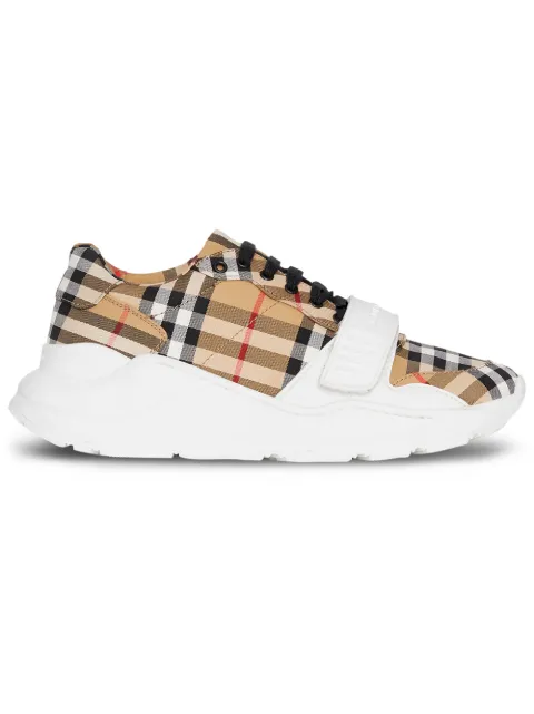 Click to view more detailed imagery on our partner's website Burberry Men's Chunky Signature Check Trainer Sneakers With Grip Strap In Nude & Neutrals