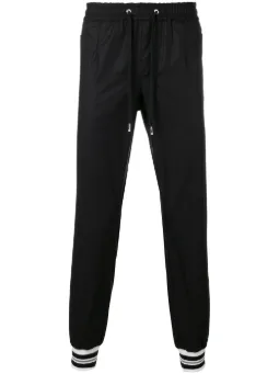 Calça esportiva com punhos listrados