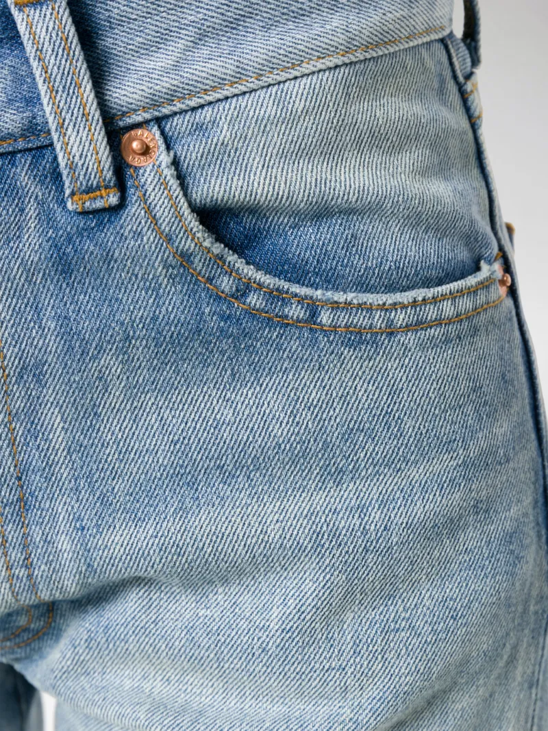 Balenciaga twisted-leg jeans blue | MODES
