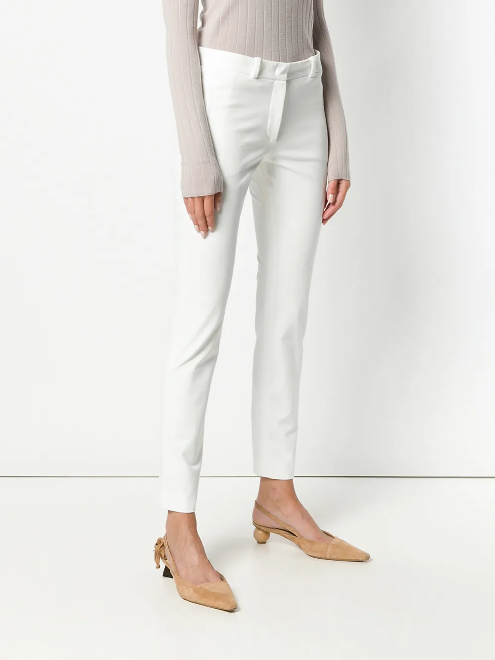 white fitted trousers