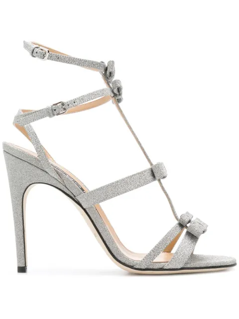 Click to view more detailed imagery on our partner's website Sergio Rossi Women's Glitter Bow High-Heel Sandals In Metallic