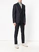 Tagliatore traje con doble botonadura