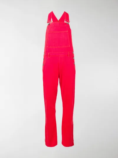 GANNI flared denim overalls red | MODES