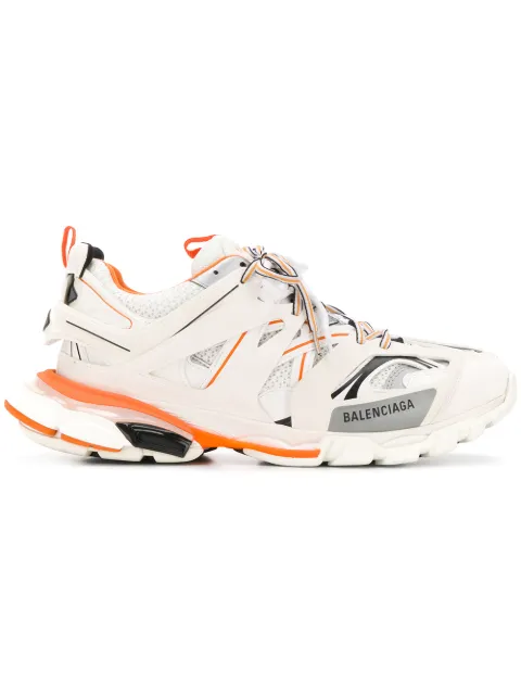 Click to view more detailed imagery on our partner's website Balenciaga Track Logo-Detailed Leather, Mesh And Rubber Sneakers In 9059 Blanc/ Orange
