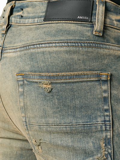 faded skinny jeans | AMIRI | Eraldo.com