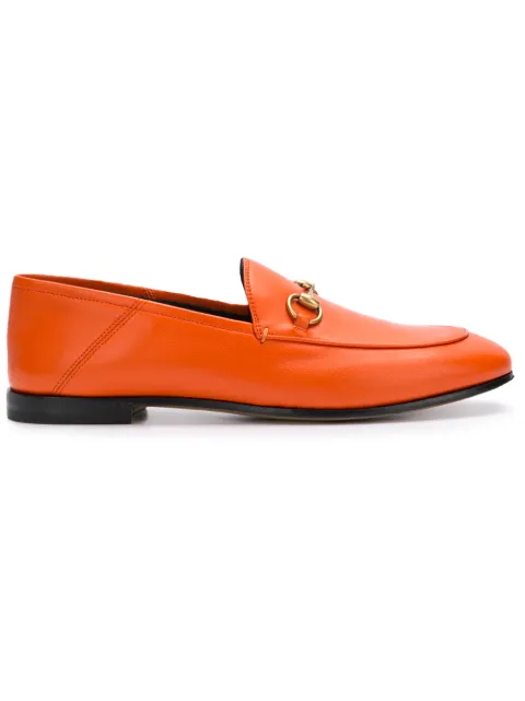 Click to view more detailed imagery on our partner's website Gucci Brixton Collapsible-Heel Leather Loafers In Orange