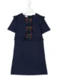 الصورة 1 من Gucci Kids فستان بفيونكة على المقدمة