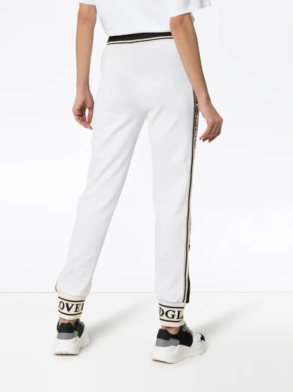 Shop Dolce & Gabbana Logo detail cotton track pants with Express Shop Dolce & Gabbana Logo detail cotton track pants with Express
