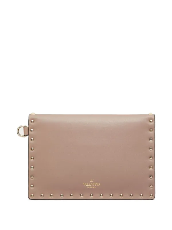 Valentino Garavani Rockstud Leather Clutch Bag | Pink | FARFETCH