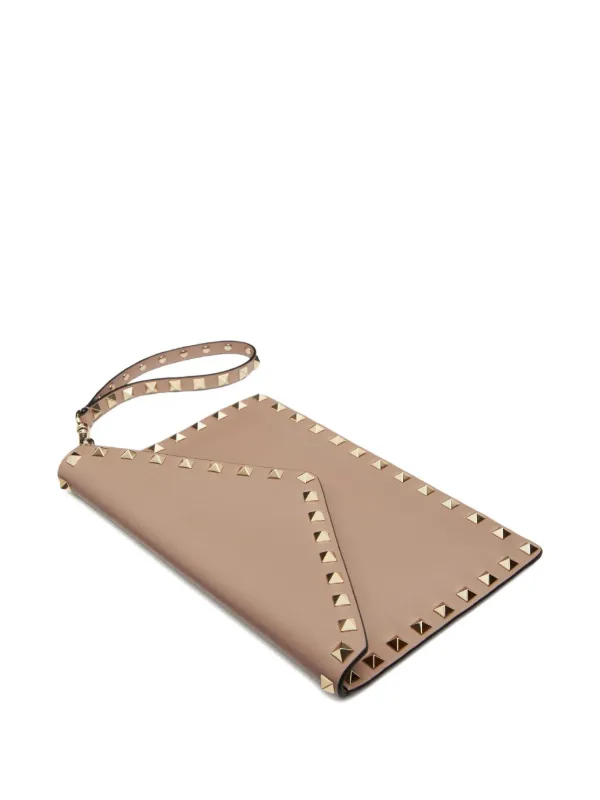 Valentino Garavani Rockstud Leather Clutch Bag | Pink | FARFETCH