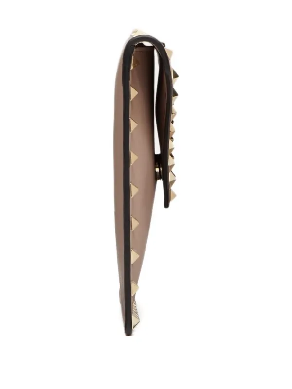 Valentino Garavani Rockstud Leather Clutch Bag | Pink | FARFETCH