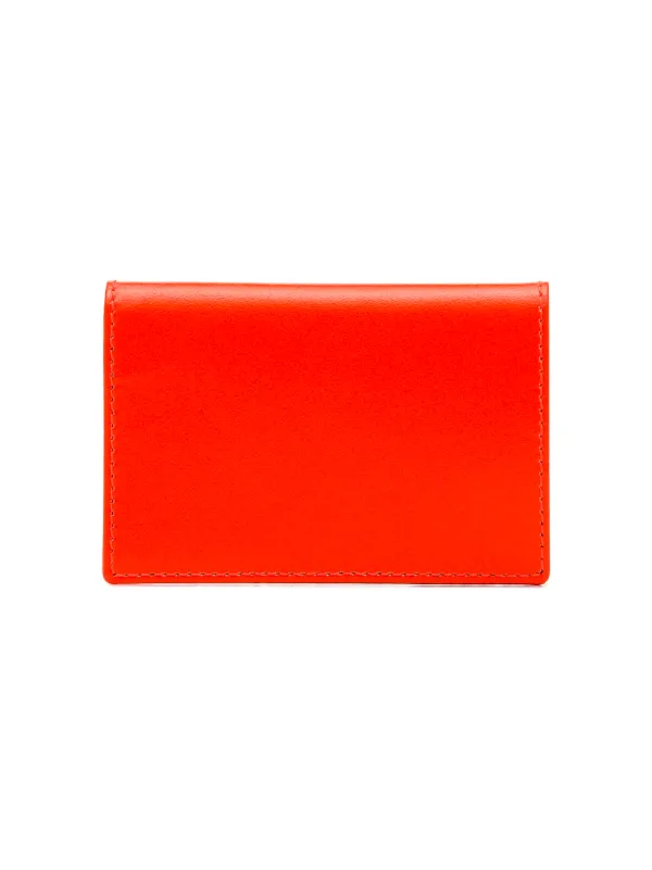 comme des garcons fluorescent wallet