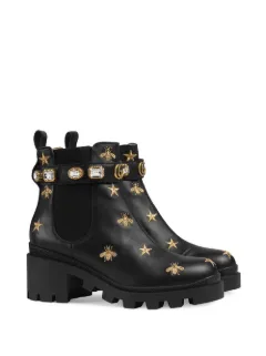 embroidered leather ankle boot with belt gucci